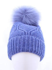 Blue knitted wool hat isolated on white background