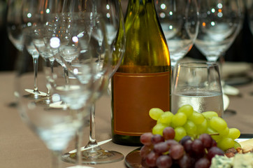 Bottle of Red Wine Cheese Assortment for Snack. Free space for text. 