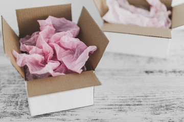 competition concept, delivery parcel boxes side by side with slightly different colors symbol of...