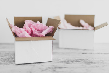 competition concept, delivery parcel boxes side by side with slightly different colors symbol of...