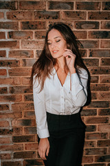 Portrait of Young Brunette Girl with Long Hair, Fashion Street Style
