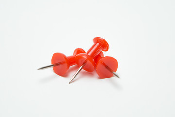 Close up of Red pin  on white background