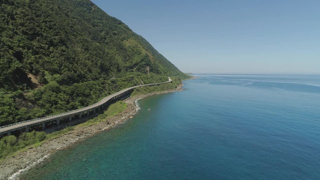 Highway on the viaduct by the sea. Philippines, Luzon