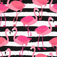 Allover seamless repeat pattern with sophisticated flamingos in pink and coral on a black and white torn grunge cabana stripe