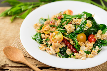 Northern Thai food (Pad Pak Chiang Da), stir fried gurmar leaf with egg