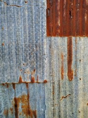 Rusty zinc wall, vintage texture background.