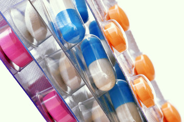macro of various pills in blister packs