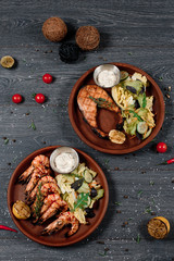 grilled salmon red fish and shrimp set close up food for restaurant menu