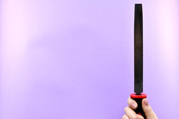 The file in the hand is pointing up to the right.