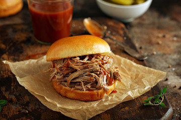 Pulled pork sandwich with brioche buns and pickles
