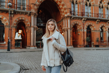 Fototapeta premium Portrait of Charming Young Blonde Girl, Fashion Street Style