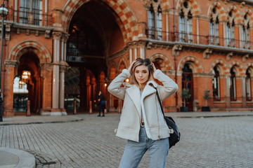 Fototapeta premium Portrait of Charming Young Blonde Girl, Fashion Street Style