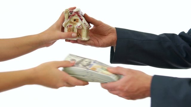 Businessman Taking Bunch of USD Dollar Banknote and Selling House