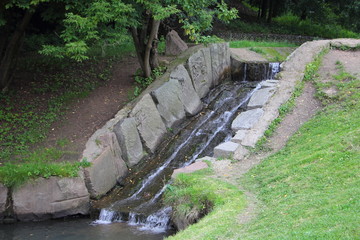 Moscow Waterfall in Park Kolomenskoe on summer day