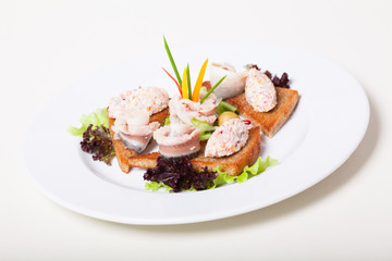 Toasts with herring