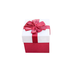 Red gift box  decorative with colorful bow ribbon isolated on white background , clipping path for Christmas or New Year and  Valentine's day