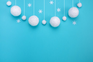 Christmas composition. The concept of a winter festive background, snowfall from white balls on a...
