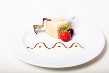 Fancy decorated Napoleon cake with fresh berries