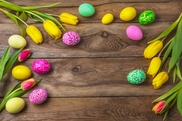 Easter rustic background with floral decorated eggs