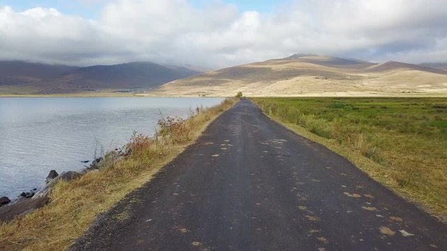 Flying on the lake side road, Cildir, Ardahan, Kars, Turkey