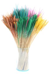 Colorful dry grass on white background