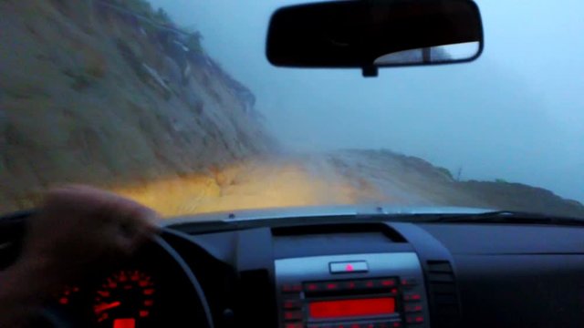 Driving dangerous foggy mountain dirt road, without view, Rize, Turkey