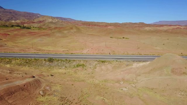 A man walking alone on the higway in Igdir, Turkey