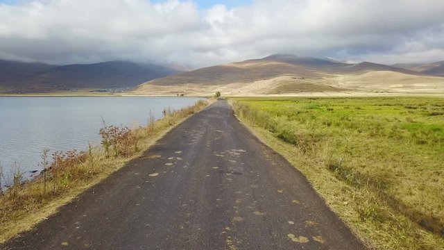 Flying on the lake side road, Cildir, Ardahan, Kars, Turkey