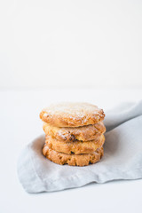 Stacked cookies on a linen napkin. Close up.