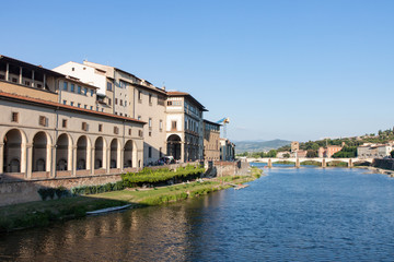Fototapeta na wymiar View Along the Arno River from the Ponte Vecchio in Florence