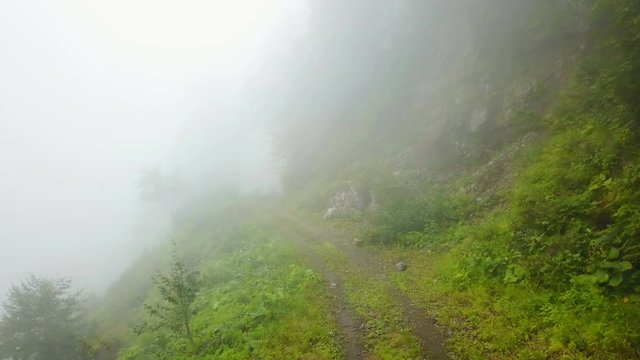 Foggy misty green mountain dirt road, beauty Kackar, Rize, Turkey