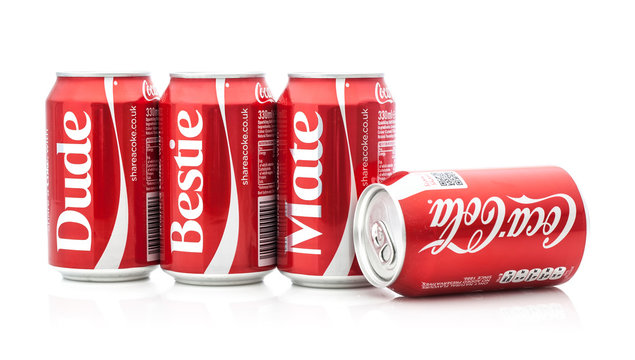 Row of share with Coca-Cola cans on a white background