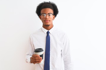 Young african american businessman drinking cup of coffee over isolated white background with a confident expression on smart face thinking serious