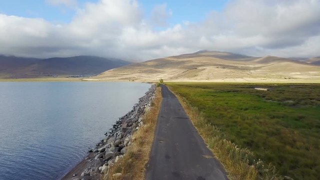 Flying on the lake side road, Cildir, Ardahan, Kars, Turkey