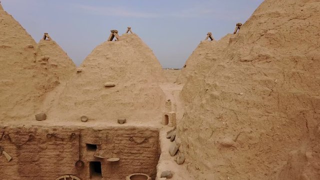 Harran beehive houses that conic roofs, mudbrick wall, Urfa, Turkey