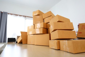 brown box post package many size preparing express delivery for consumer order in home office of freelance work online