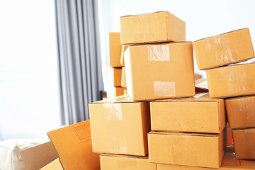 brown box post package many size preparing express delivery for consumer order in home office of freelance work online