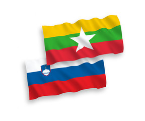 Flags of Slovenia and Myanmar on a white background
