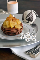 Chocholate christmas pancakes and table decoration