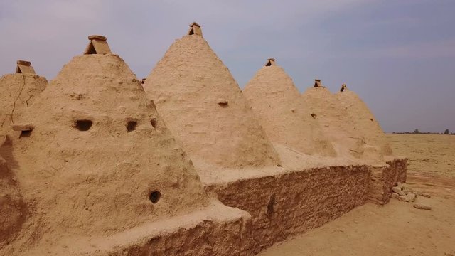 Harran beehive houses that conic roofs, mudbrick wall, Urfa, Turkey