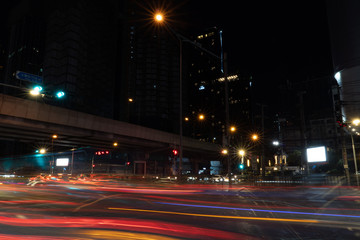 Fototapeta na wymiar Cityscape Traffic night at Rama 9 cross-junction in bangkok city