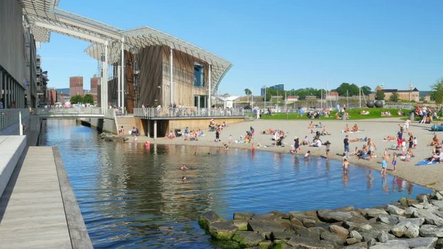 people swimming at astrup fearnley museum, oslo downtown, norway
