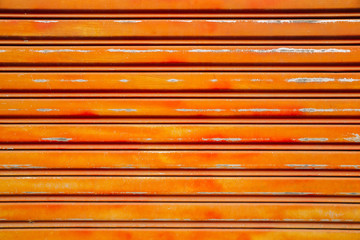 Orange metal shutter door background
