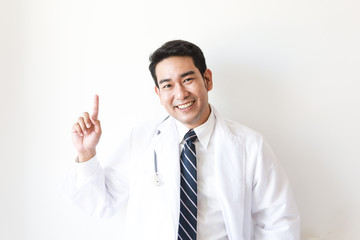Asian man in Doctor uniform on white background in hospital