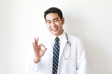Asian man in Doctor uniform on white background in hospital