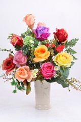 Decorative artificial flowers on white background