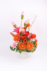 Decorative artificial flowers on white background