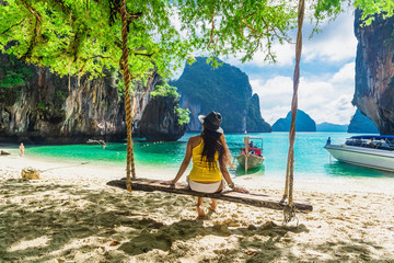 Traveler woman in bikini on swing joy beautiful nature scenic landscape Lao Lading island Krabi,...