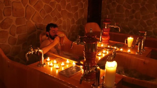 happy man in czech beer spa in prague