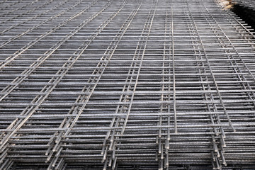 Rebar, reinforcing bars or steel close up, reinforcement steel, wires mesh of steel used as a tension device in reinforced concrete.